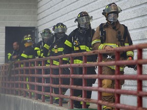 Windsor firefighters battle a blaze at the Staples store in the 7100 block of Tecumseh Rd E on Wednesday, July 27, 2016.