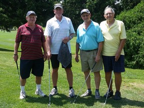 Tom Steinke, center left,  used a nine-iron for a hole-in-one on the 130-yard No. 3 at Orchard View. The witnesses were John Baker, left, Dennis Weedmark, centre right and Chick Skoreski.