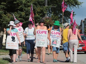 Striking library workers and members of CUPE picket in front of the Harrow Library on Monday, July 25, 2016.
