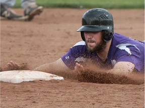 Tecumseh's Mitch Delaney slides into second during the Ontario Senior Elimination Tournament against Milton on July 29, 2016 at the Lacasse Park in Tecumseh.