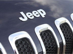 The traditional Jeep logo sits perched up on the nose of the Cherokee as a reminder of its iconic roots.  [PNG Merlin Archive] ORG XMIT: POS2014052817434322