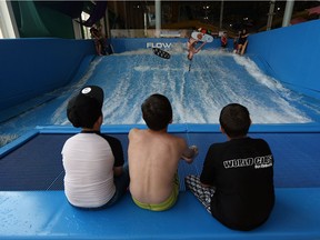 In this file photo, Brad Spencer rides the Flow Rider at the Windsor International Aquatic and Training Centre during a demonstration by professional flow riders in Windsor on Wednesday, July 20, 2016.