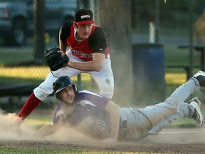 Tecumseh Thunder Seniors Mitch Delaney is tagged out at third by the Windsor Selects Juniors Jack Zimmerman at Lacasse Park in Tecumseh on June 8, 2016.