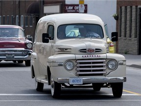 A Vintage Mercury panel truck rumbles north on Pillette Road Wednesday  to promote the new Ouellette Car Cruise scheduled for Aug. 19 in downtown Windsor. (NICK BRANCACCIO/Windsor Star)