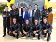 Joseph Abdallah, his sons Anthony and Joseph Jr, join Breitling Canada President Ted Schneider and members of the Breitling Jet Team during special event at Joseph Anthony Fine Jewelry in Windsor, Ontario on August 23, 2016. The Breitling Jet Team, the largest professional civilian team of pilots, currently perform at airshows around the world. The event featured a special showcase of Breitling watches and also gave customers a chance to fly in a computer flight simulator. (JASON KRYK/Windsor Star)