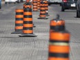 Road construction cones are seen in this file photo.