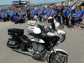 The Law Enforcement Torch Run For Special Olympics heads out from Festival Plaza in Windsor on Thursday, May 14, 2015. The annual event raises money for the Special Olympics program as well as year round programs.