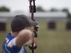 Cameron Warren, 14, from Lethbridge, Alta., competes in the Canadian National 3D Archery Championships at Malden Park, Monday, August 1, 2016.