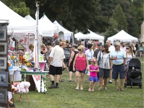 People check out dozens of vendors at the Art by the River at Fort Malden in Amherstburg, Saturday, Aug. 27, 2016.