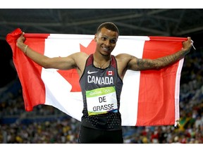 RIO DE JANEIRO, BRAZIL - AUGUST 18:  Andre de Grasse of Canada celebrates winning silver in the Men's 200m Final on Day 13 of the Rio 2016 Olympic Games at the Olympic Stadium on August 18, 2016 in Rio de Janeiro, Brazil.