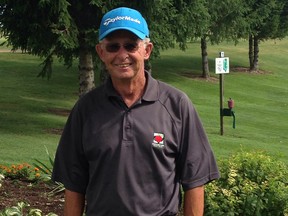 Golf pro Dave Bell celebrates his second career hole-in-one. Bell used a nine-iron to ace the 138-yard third-hole at Orchard View. The shot was witnessed by Glen Rideout.