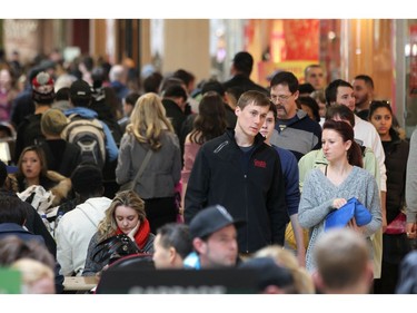 Dec. 26, 2014: Shoppers look for Boxing Day sales at a crowded Devonshire Mall.