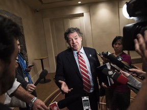 David Paterson, vice-president of corporate affairs for General Motors Canada, speaks to media after a meeting with Unifor, The Canadian Auto Workers Union, in Toronto on Aug. 10, 2016.
