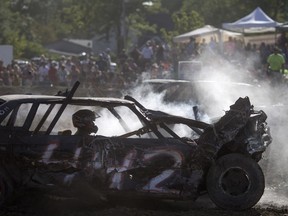 Drivers compete in the pro mod competition at the Comber Fair Demolition Derby Aug. 7, 2016.