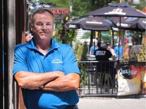 Ben Klundert, past president of the Greater Windsor Home Builders' Association, says he will now consider developing property in the city core, given that council waived development fees. He is shown on Ouellette Avenue on Aug. 3, 2016.