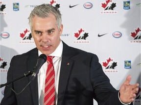 Dominique Ducharme speaks during a ceremony in Montreal, Monday, June 6, 2016 where he was named new head coach of Canada's 2016-2017 national junior hockey team.