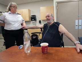 The Essex-Windsor Emergency Medical Services recently launched the Vulnerable Patient Navigator (VPN) program. A media conference was held on Friday, August 5, 2016, at the Tecumseh EMS station. Cathie Hedges, captain, professional standards for the EMS service is shown with Don Fortin, who has benefitted from the new program.