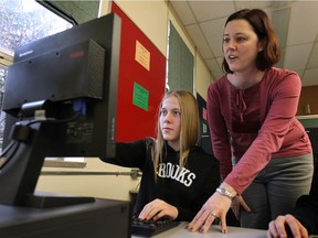 Riverside Secondary School student Sarah Snyder, 15, and teacher Aimee Demeter participated in the EQAO's online pilot project test Tuesday, Nov. 25, 2014, in Windsor, ON.