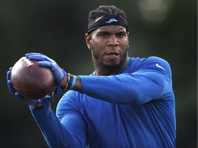 Detroit Lions tight end Eric Ebron catches a pass during NFL football practice in Allen Park, Mich., Monday, Aug. 1, 2016.