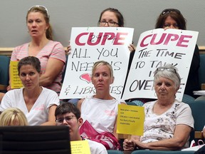 Members from several unions joined to support the striking library workers during the Essex County Council meeting in Essex, Aug. 10, 2016.