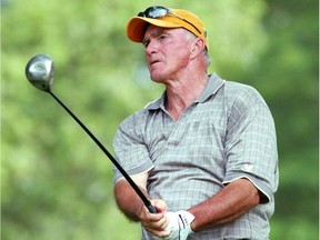 Don Harrison watches his drive at the Canadian Senior Open qualifying tournament at the Kingsville Golf Club 2002. The longtime golf pro died Wednesday at the age of 72.