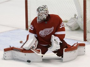 Red Wings goalie Jimmy Howard deflects a shot during a game against the Philadelphia Flyers on Wednesday, April 6, 2016, in Detroit.