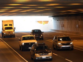 WINDSOR, ON.: JANUARY 2, 2015 -- Lights illuminate automobiles as they pass through a tunnel on the Herb Gray Parkway, Friday, Jan. 2, 2015. (DAX MELMER/The Windsor Star)