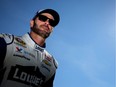 Jimmie Johnson, driver of the #48 Lowe's Chevrolet, waits on the grid during qualifying for the NASCAR Sprint Cup Series Pure Michigan 400 at Michigan International Speedway on Friday, Aug. 26, 2016 in Brooklyn, Mich.