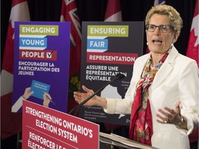 Ontario Premier Kathleen Wynne makes an election system announcement at the Ontario Legislature in Toronto on Thursday June 4, 2015.