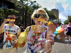 Windsor-Essex Pride Fest parade participants Krystina Bigelow (right) and Colm Holmes (left) in 2013.