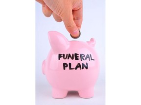 Saving, planning for a funeral. Photo by Getty Images.