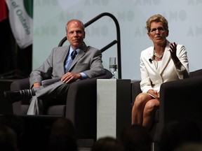 Premier Kathleen Wynne and Windsor Star reporter Craig Pearson take part in a Q & A session during the Association of Municipalities Ontario annual conference at Caesars Windsor on Monday, August 15, 2016.