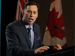 Brad Duguid, Minister of Economic Development and Growth, makes an announcement during the AMO conference in Windsor on Aug. 16, 2016.