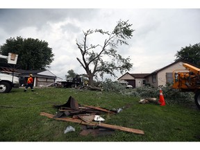 WINDSOR, ON. AUGUST 25, 2016. --  A once proud maple tree is reduced to bare bones by a tornado on Victory Street in LaSalle on Thursday, August 25, 2016. The tornado cut a narrow path several blocks long and caused extensive damage to several homes.                   (TYLER BROWNBRIDGE / WINDSOR STAR)
