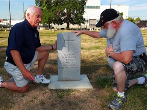 Windsor Veterans Memorial Services Committee members Wayne Hillman, left, and Karl Lovett have replaced unmarked graves of soldiers at Windsor Grove Cemetery Wednesday Aug. 10, 2016.
