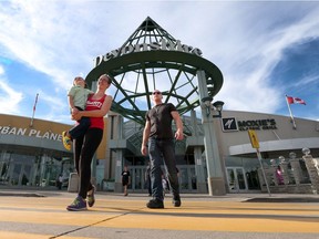 Jynx Dresser walks with Xavier, age 4 and Tristan St. Louis, at Devonshire Mall on Tuesday, Aug. 16, 2016 in Windsor. The mall is investing $70 million in renovations.