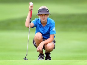 Kyla Charlebois, from Pointe West lines up a putt on the 18th hole at Roseland Golf Course during the Essex-Kent Junior Golf Tournament on Aug. 16, 2016 in Windsor.