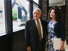 St. Clair College president Patti France, right, and retired president Dr. John Strasser look out at the new Strasser Student Life Centre following a ground-breaking ceremony at St. Clair College's main campus on Aug. 18, 2016.
