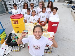 Maya Mikhael and her friends hold the 4th annual  fundraiser to  help community food banks and the Ronald McDonald House on Aug. 19, 2016.