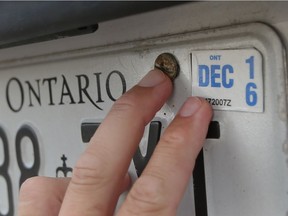 A licence plate sticker is displayed in this Aug. 24, 2016 photo. The province is hiking the cost of licence plate sticker renewals by $12 starting on Sept. 1.