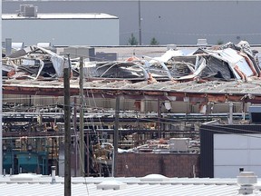 The Kautex Corporation roof was severely damaged from a tornado on Wednesday evening.  Crews continue to clean up the area of Kautex Drive,  Deziel Drive and St. Etienne Blvd. in Windsor, Ontario on August 26, 2016.