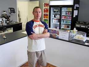 Windsor Sandwich Shop owner Lawrence Lavender at the counter of his cafe on Aug. 18, 2016.