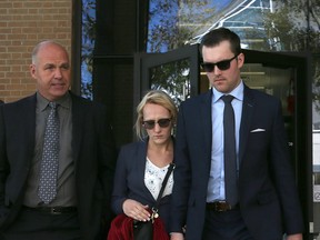 DJ Cassady, right, leaves the Superior Court of Justice in Windsor with supporters including his father, David Cassady, far left. DJ Cassady has pleaded guilty to criminal negligence causing death in connection with a fatal 2015 motorcycle crash.