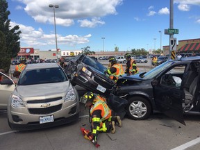 Emergency crews on the scene of a multi-vehicle crash on Tecumseh Road near Tecumseh Mall on Sept. 12, 2016. (Dan Janisse/Windsor Star)