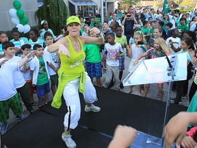 Local students and staff with the French Catholic school board as well as local French citizens celebrated the Franco-Ontarian Flag Day at the Windsor City Hall on Thursday, Sept. 22, 2016. Dance instructor Marica Soleski gets the students moving during the event. (DAN JANISSE/The Windsor Star)
