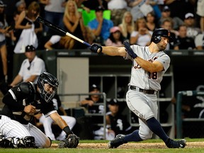 Tyler Collins #18 of the Detroit Tigers strikes out swinging to David Robertson #30 of the Chicago White Sox (not pictured) for the final out of the game at U.S. Cellular Field on September 6, 2016 in Chicago, Illinois. The Chicago White Sox won 2-0. (Photo by Jon Durr/Getty Images)