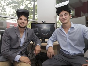 Co-creators of 3DFX, Michael Hoppe, 26, left, and Chris Jedlinski, 22, are pictured with their virtual reality program at the Downtown Accelerator Friday, September 16, 2016.