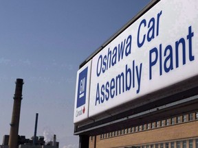 A sign outside Oshawa's General Motors car assembly plant is shown in Oshawa, Ont., Sept.17, 2012.