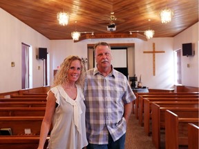 Tim and Christine Jupp stand inside the chapel of the 139-year-old Lighthouse Baptist Church on King Street in Amherstburg,