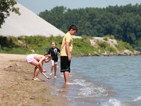 Kids enjoy Windsor's Sandpoint Beach in June 2011.